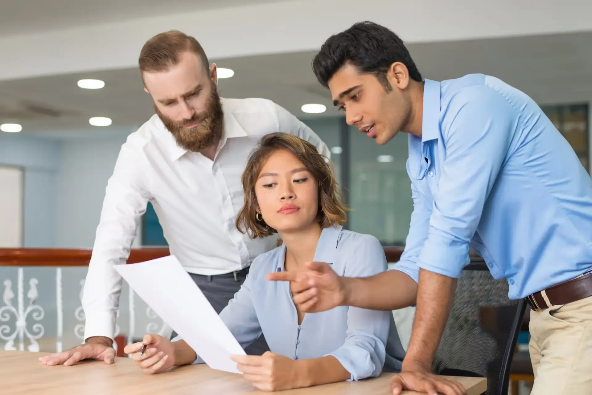 business-colleagues-helping-newcomer-complete-job-application
